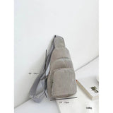 Gray corduroy sling bag with approximate dimensions