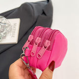 Three separate zippered compartments and detachable metal clasp