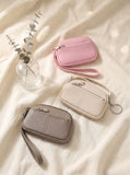 Pink, off-white and gray wristlet coin purses