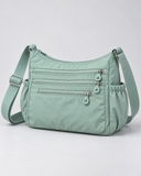 WeeNOD Mint Multi-Pocket Crossbody