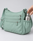 WeeNOD Mint Multi-Pocket Crossbody