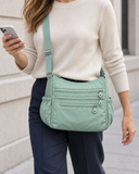 WeeNOD Mint Multi-Pocket Crossbody