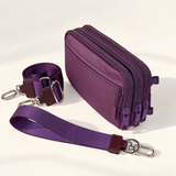 purple nylon wallet in three-quarter side view with matching wristlet and crossbody straps