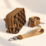 brown black check nylon wallet in three-quarter side view with matching wristlet and crossbody straps